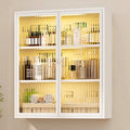 Modern hanging metal bathroom storage cabinet with fluted glass doors in black and white